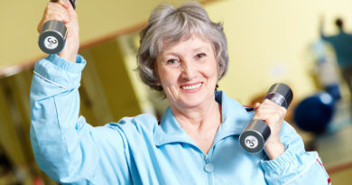 mature woman lifting weights